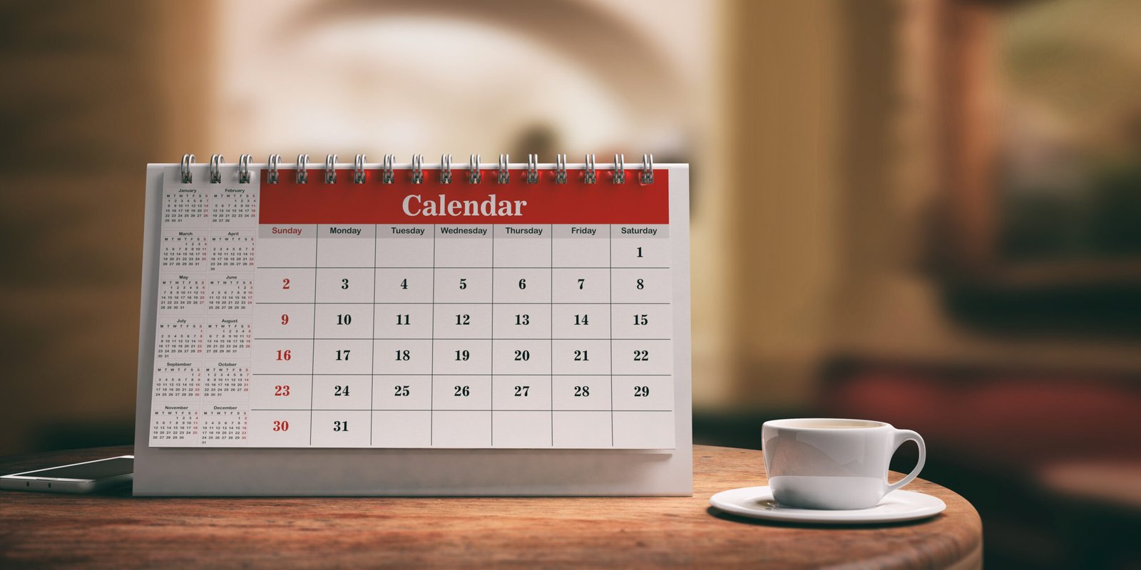 Desk calendar, a smartphone and a cup of coffee on a wooden table. 3d illustration