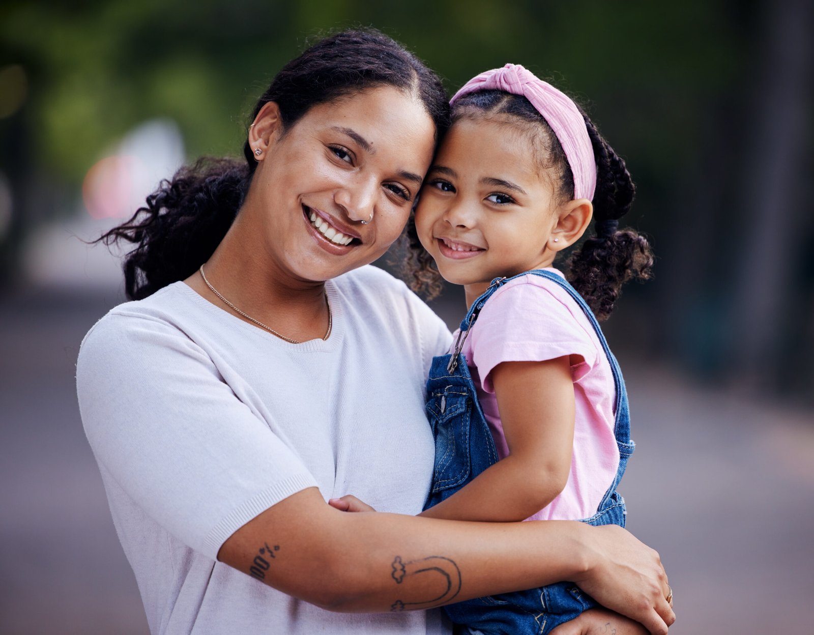 Portrait, mother and kid hug in park, fun day outdoor with love and care, happy people together in .
